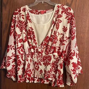 Adorable beige and red top.  Super slenderizing.  Size XL.